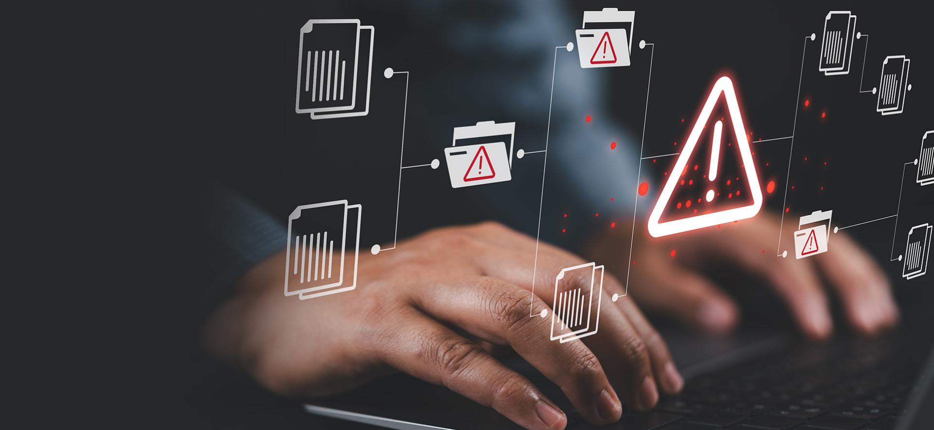 ręce na klawiaturze i lewitujące ikony 