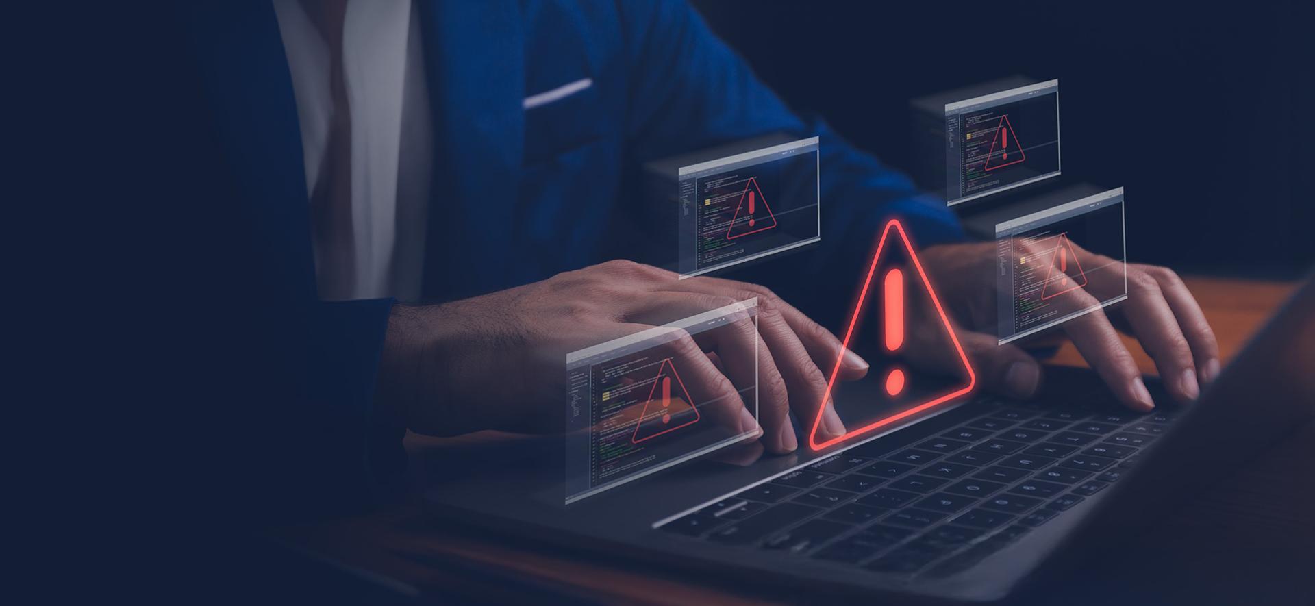 mężczyzna patrzący na monitor komputera