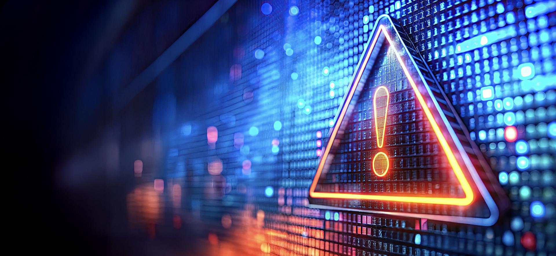 pomarańczowo-niebieski trójkąt z wykrzyknikiem