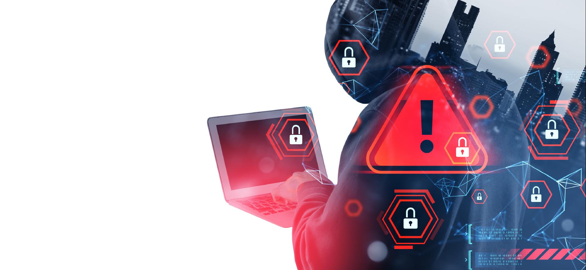 sylwetka człowieka trzymającego laptop przenikająca w panoramę miasta. Na przyszłym 