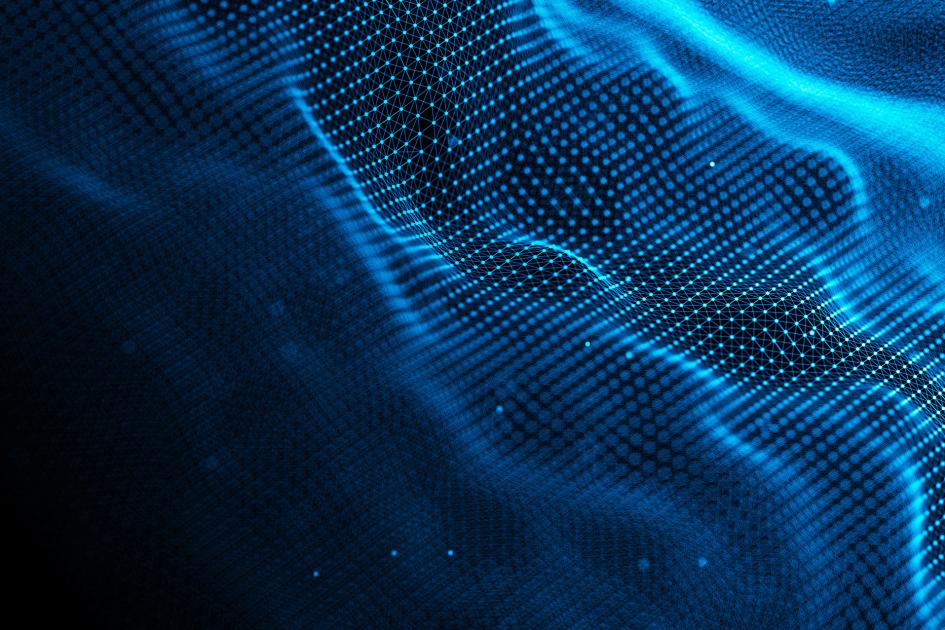 cyfrowa pofalowana płaszczyzna z niebieskich kropek