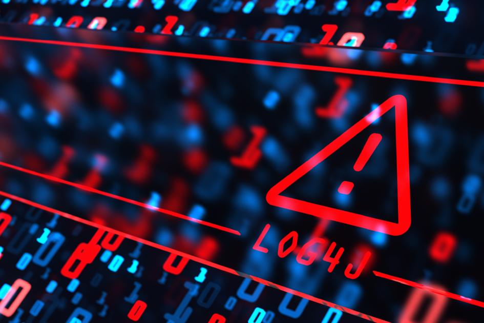 czerwony trójkąt z wykrzyknikiem w środku unosi się nad innymi ikonami